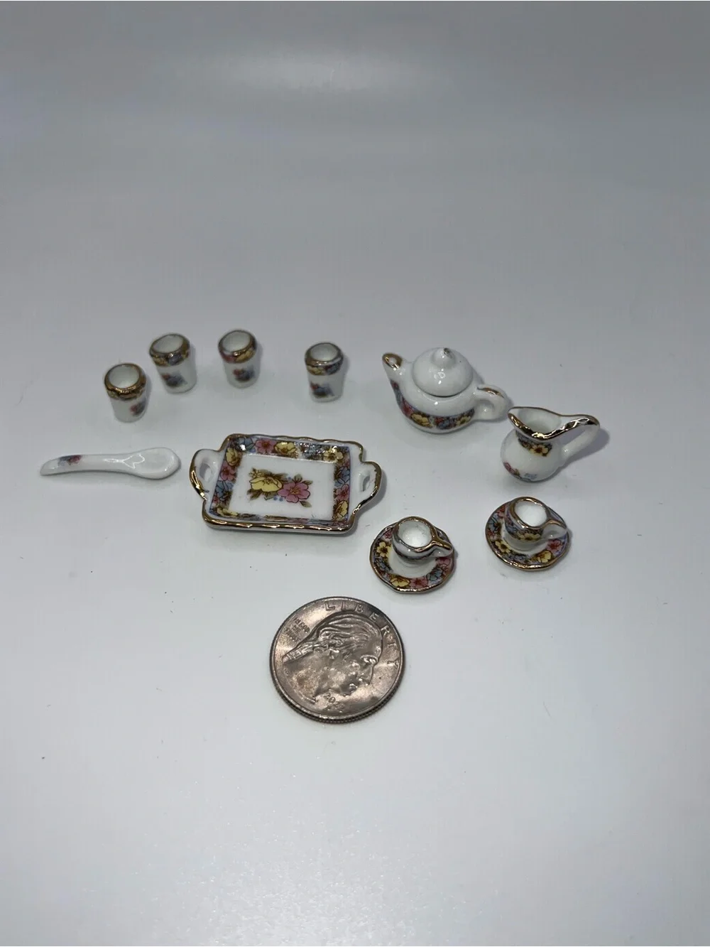 Miniature Porcelain Tea Set with Floral and Gold Trim